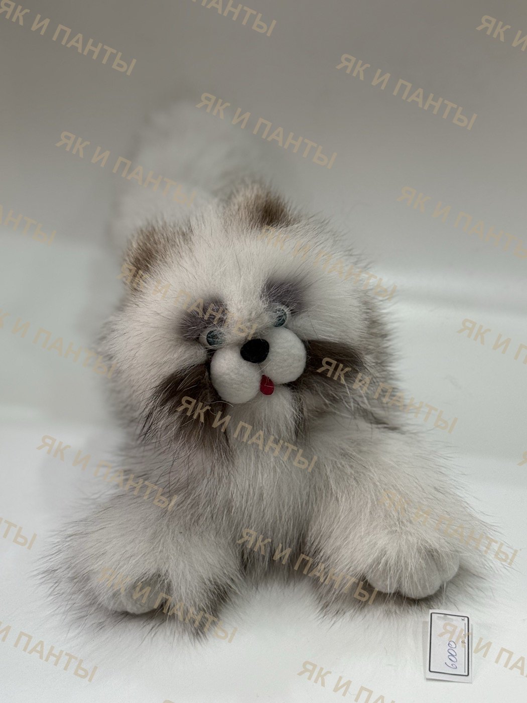 Игрушки меховые котики